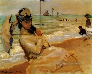 クロード・モネ Painting - トルヴィルの浜辺のカミーユ クロード・モネ